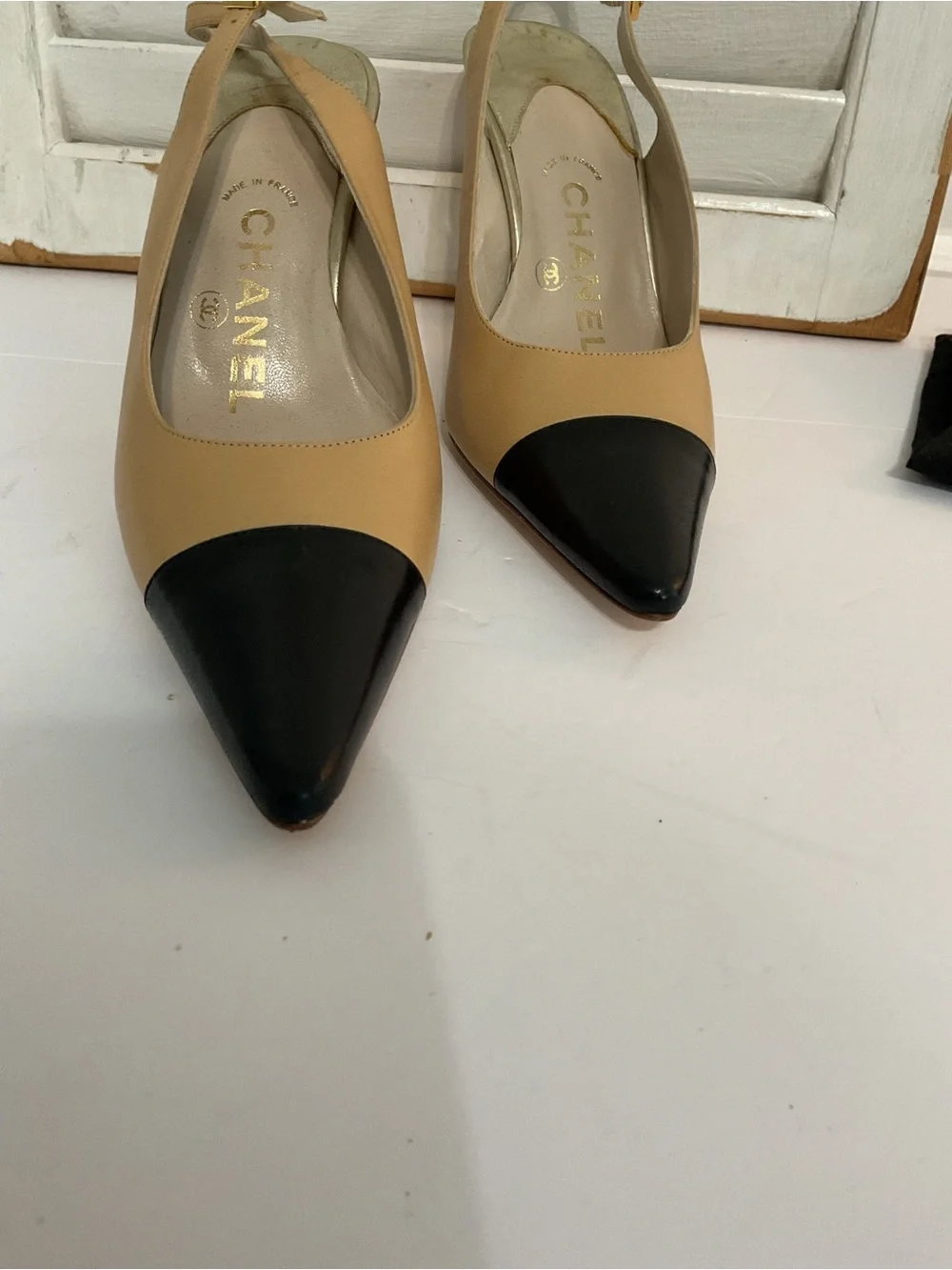 CHANEL Beige and Black Pointed Slingback Pumps